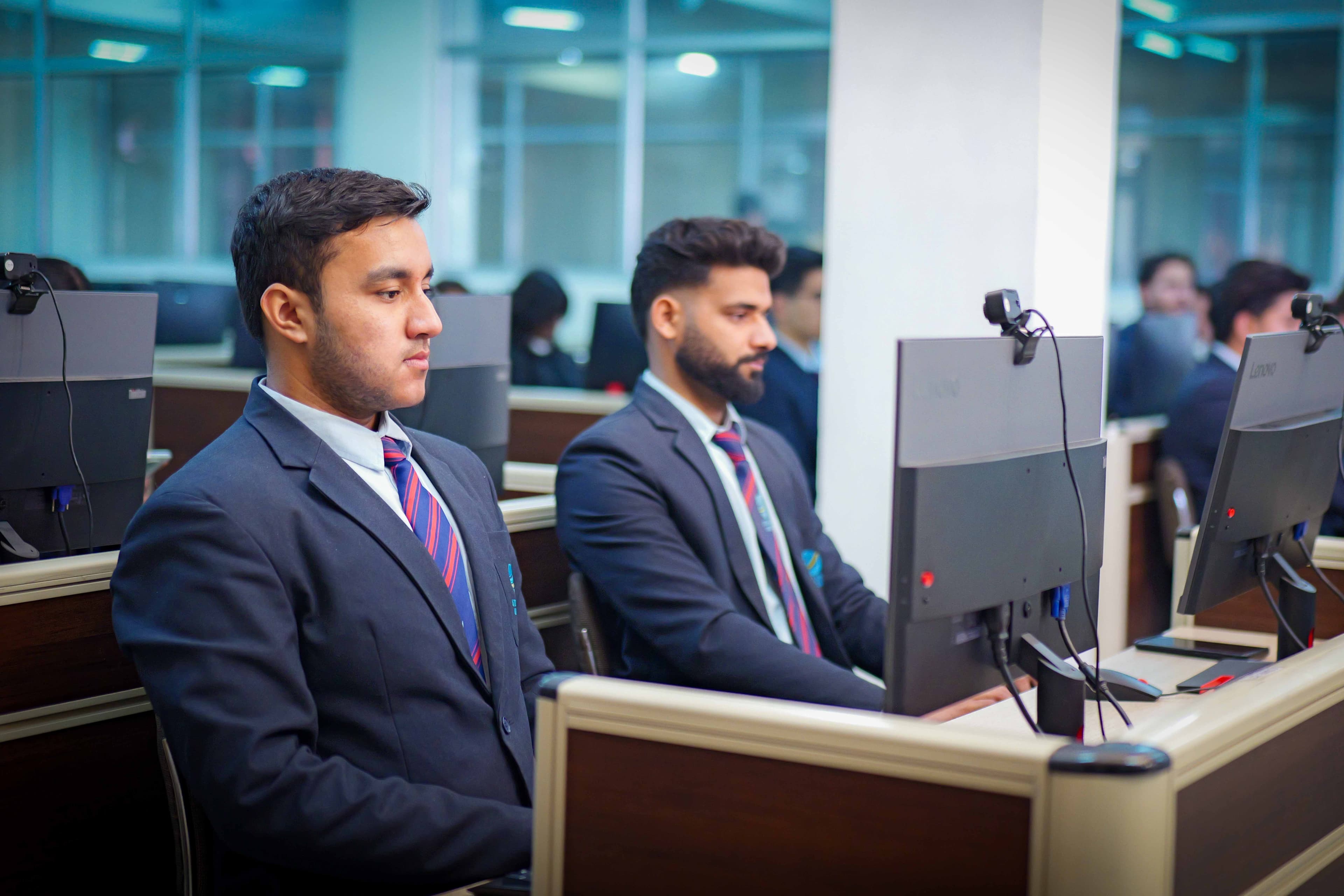 Students in advanced computer lab at Uttaranchal University
